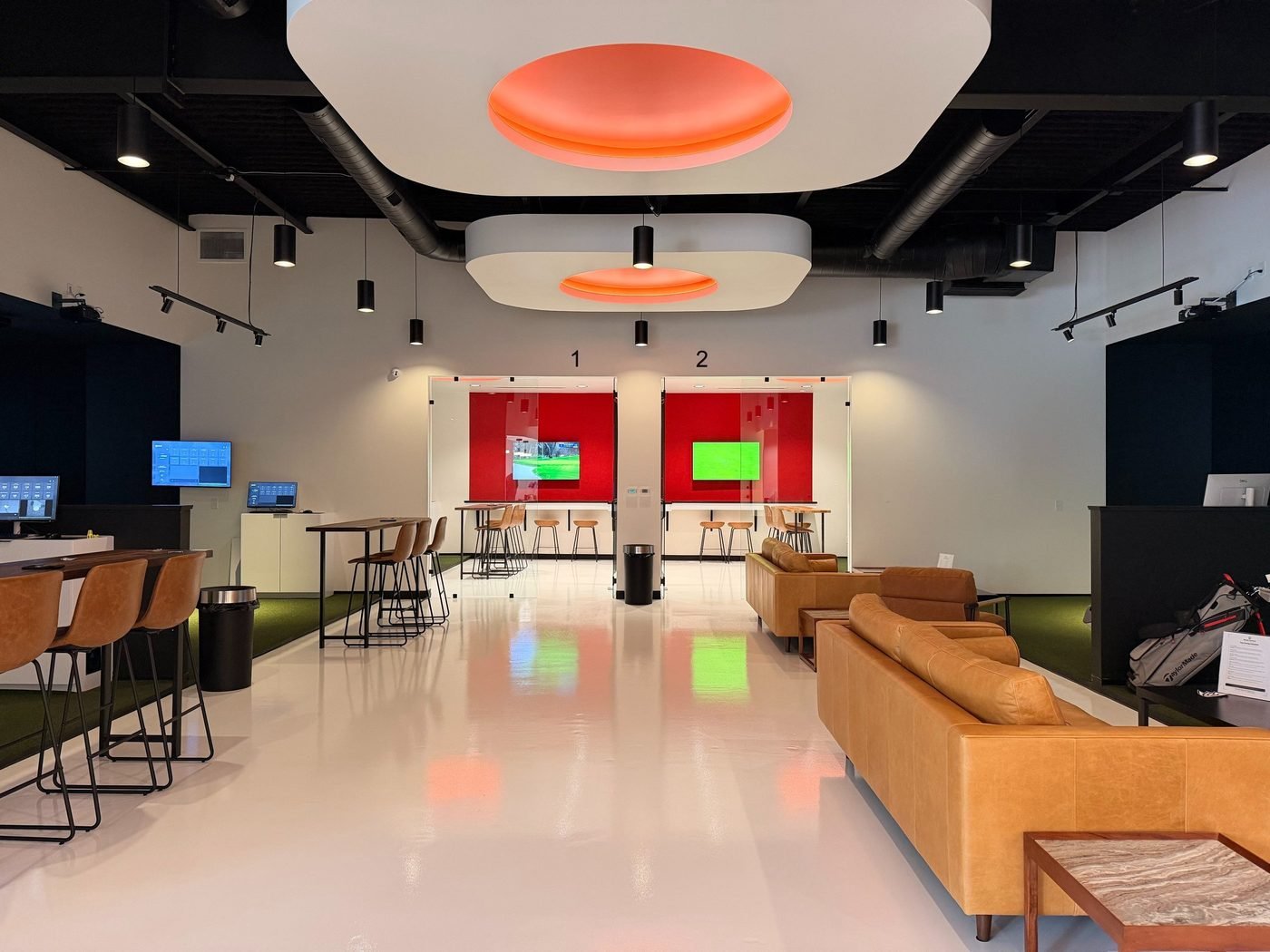 First-time guests playing in an open Birdie Central simulator bay